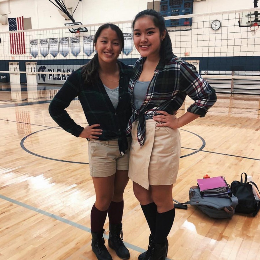 Seniors Katie Oros (left) and Nikki Chang (right) pose in their matching outfits from the movie To All the Boys Ive Loved Before. Festive outfits can be seen all around Pleasant Valley High School during Homecoming week