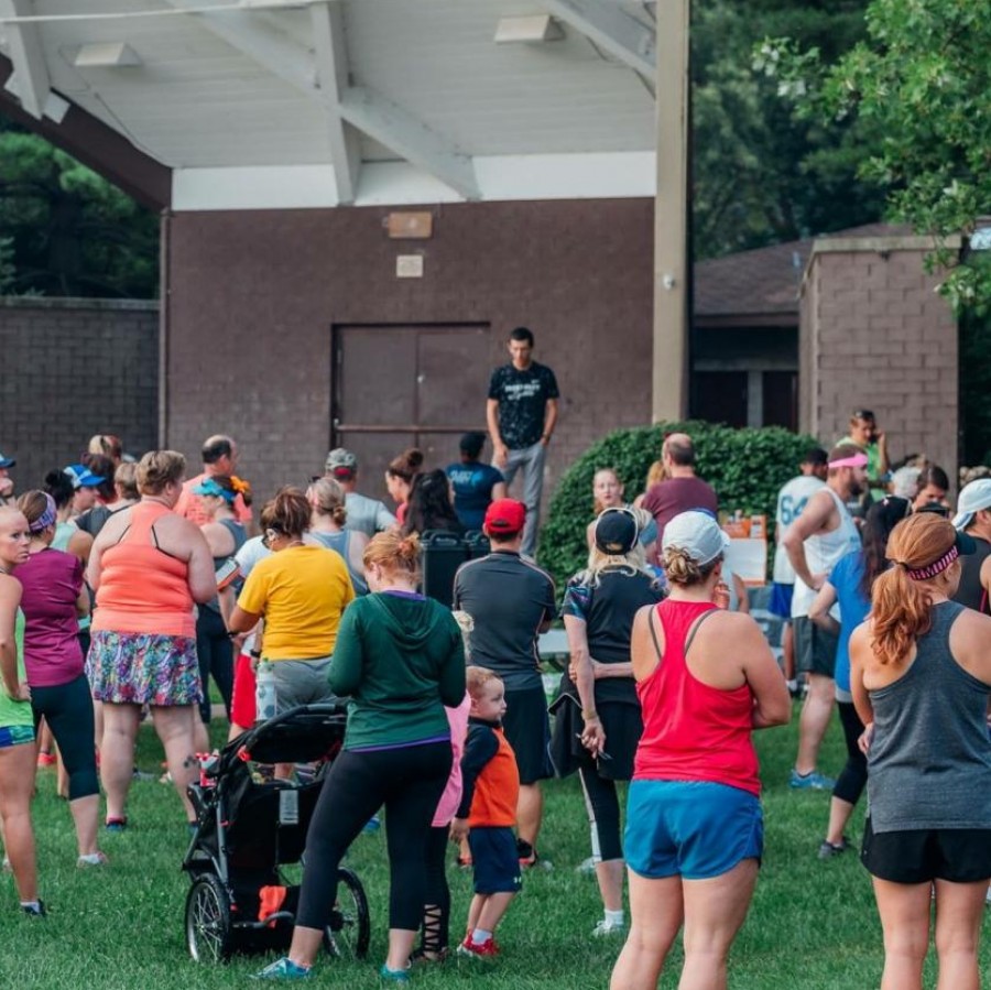 Local runners gathered for a moment of silence before they began a group run on the Duck Creek bike path in Bettendorf.