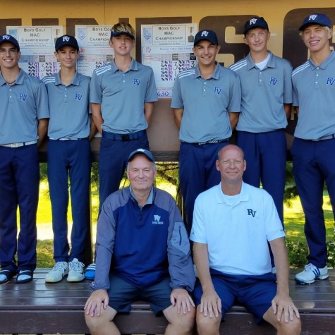 The boys golf team poses after winning MAC.