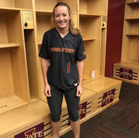 Senior Carly Spelhaug poses in a Iowa state jersey.