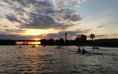 Rowers practicing as the sun sinks.