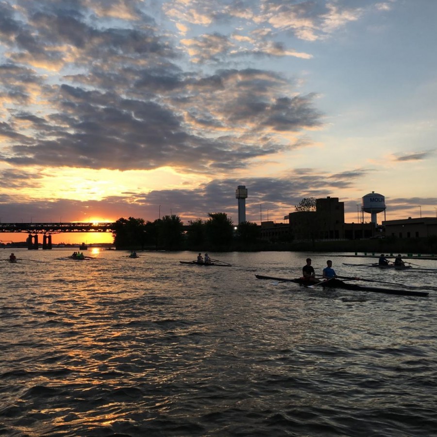 Rowers practicing as the sun sinks.