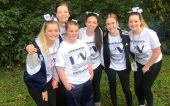 Sparkles posing for a picture at one of their events.