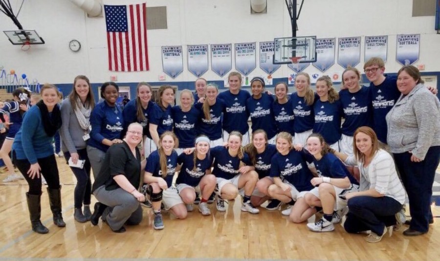 A+picture+of+the+varsity+girls+basketball+team++after+a+winning+game