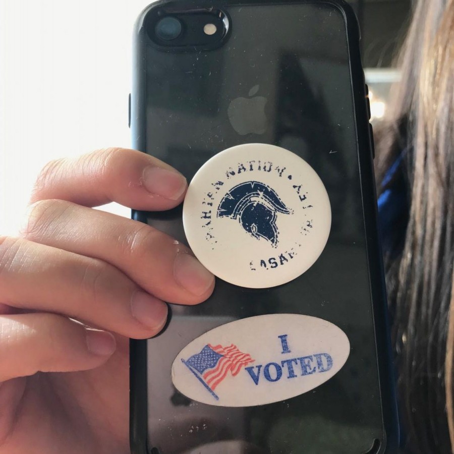 Senior Katie Oros proudly flaunted her very first I voted! sticker after voting in the midterm elections