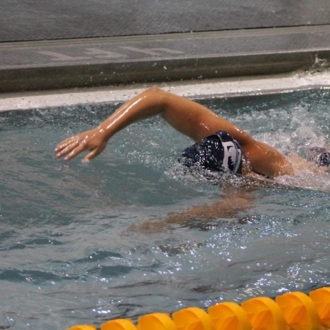 A Pleasant Valley swimmer swims.