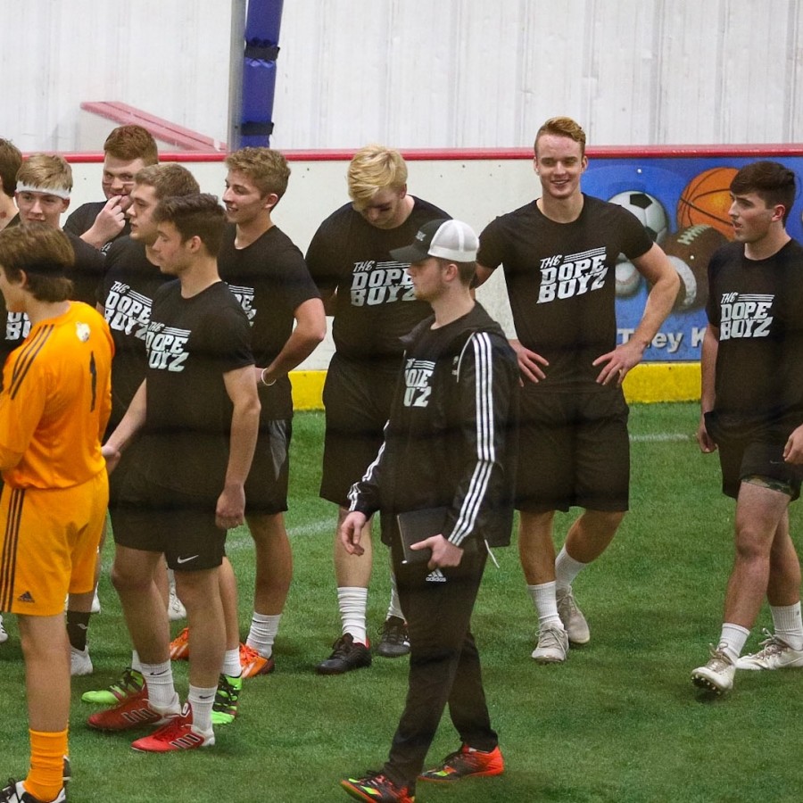 The Dope Boyz soccer team celebrates after their first victory against a team from Central High School.