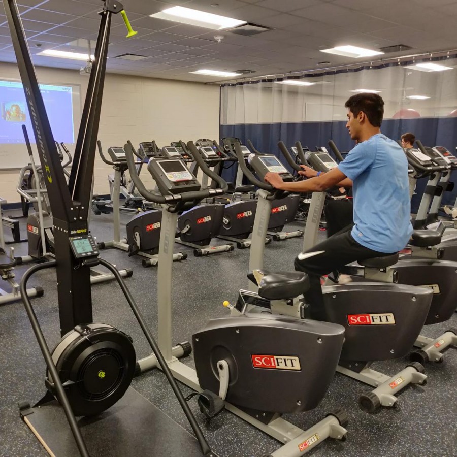 Students use the new fitness area facilities.