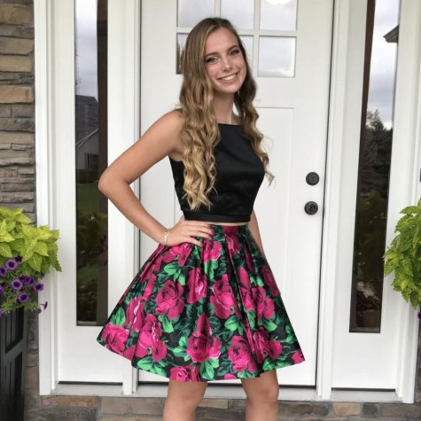 Sophomore Raegan Stein poses before attending her sophomore homecoming this past September