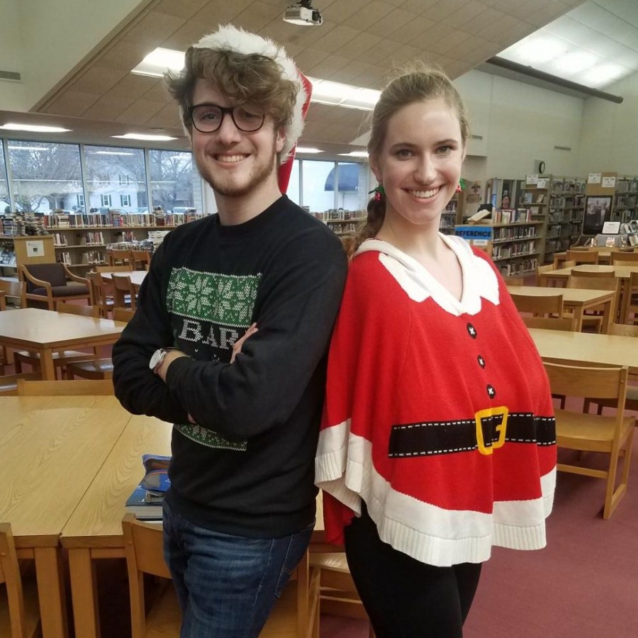 Seniors Will Mercer and Katie Bullock pose in their festive sweaters before heading off for winter break