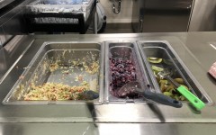 The remaining sides available during D lunch. They have been massed produced by kitchen staff and picked through by students. 
