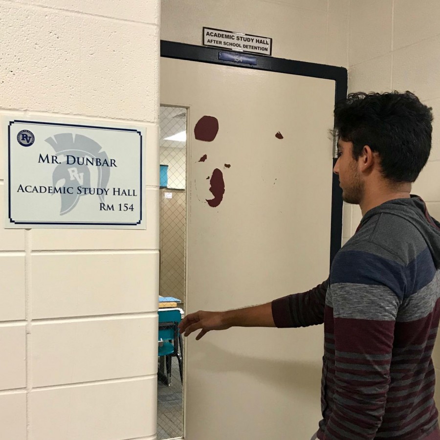 A student is entering academic study hall located in Mr. Dunbars room.