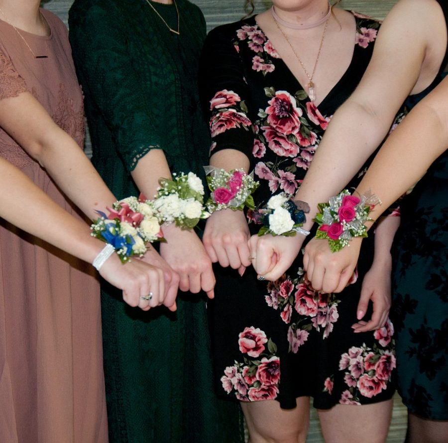 Students+at+PV+display+their+corsages+during+a+turnabout+dance