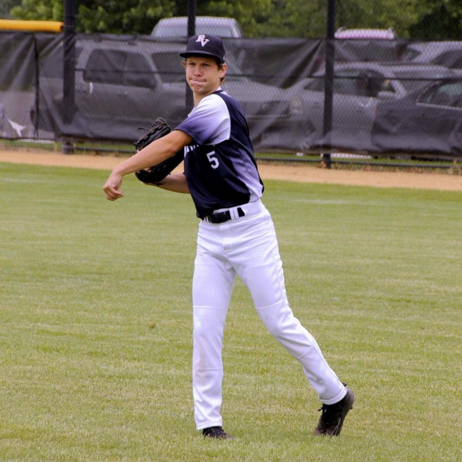 Senior Kyle McDermott throwing a baseball during his junior season.