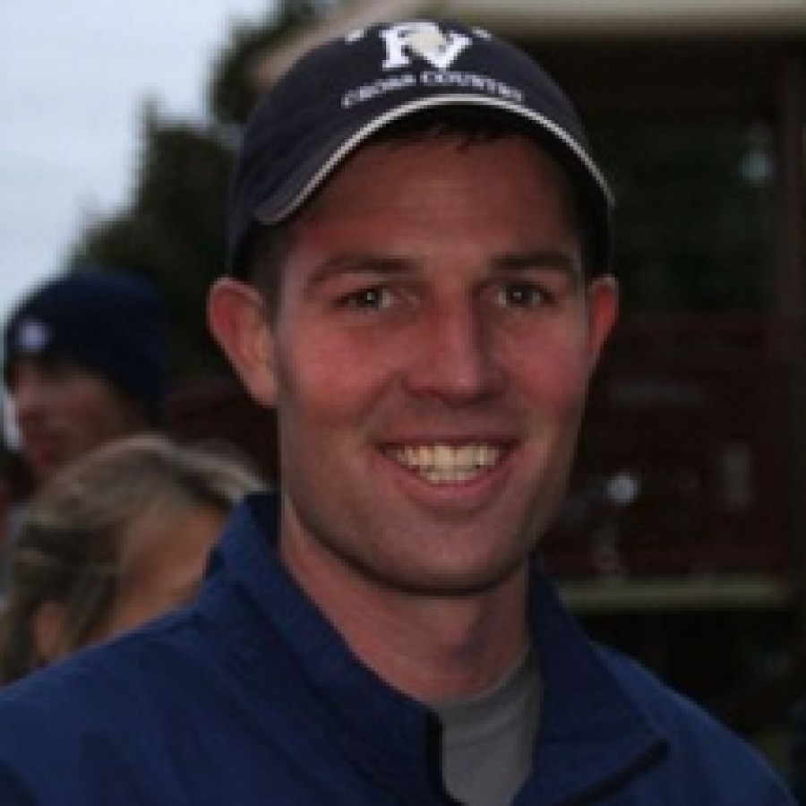 Track and Field head coach Erik Belby. Photo credit to Shield staff.