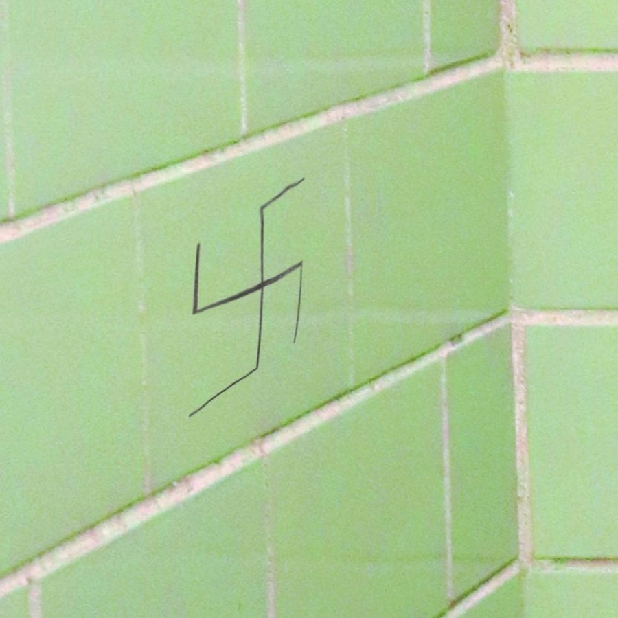 Offensive symbols like the swastika pictured have been found within the bathrooms around Pleasant Valley High School