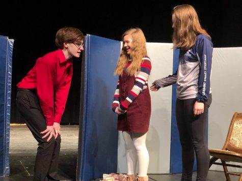 (From left) Sophomore Logan Croll, freshman Caroline Sierk and freshman Grace Engstrom play three of the four children in The Lion, the Witch, and the Wardrobe, which will perform at the high school on Jan. 25 and at various places around the Quad Cities, including One Eighty, this January.
