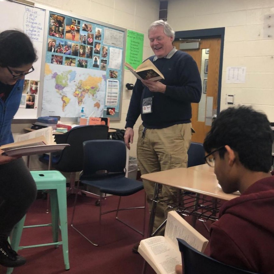 Eric Larew directs the AP Lit class through their latest literary work.