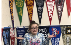 Senior Danielle Waldron shows her confusion regarding the true facts about college in PV’s career center.
