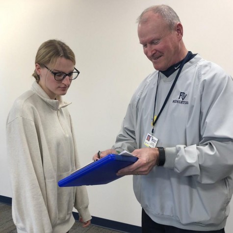 Senior Natalie Cremer looks glum after receiving a detention from Pleasant Valley High School’s Dean of Students, Randy Teemer, during her fourth period study hall. 
