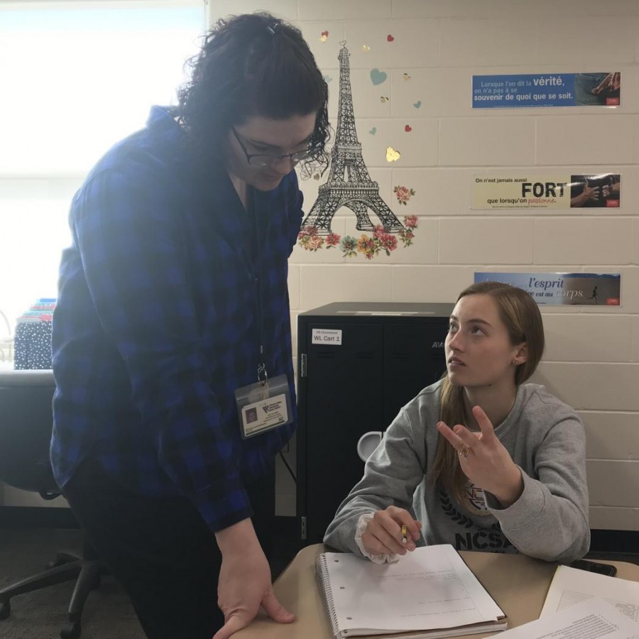 Melissa Lechtenberg French instructor at PV, helps Christy Bishop, senior at PV with her french homework