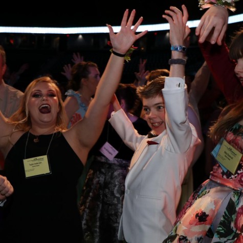 Pleasant Valley student Ethan Bond, 14, enjoys dancing the night away at the Quad Cities Night to Shine at the Tax Slayer Center in Moline on Feb. 9.  
