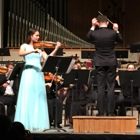  Violinist Annie Warner performs “Concerto No. 5 in A Major” by Henri Vieuxtemps with the Quad City Youth Symphony on Feb. 9. 
