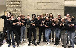 Pleasant Valley jazz choir, Leading Tones, with their first place trophy at the West Liberty Jazz Festival.