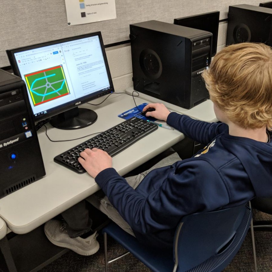 Sophomore Sam McGrath lays out the map for his prohibition-themed game he is creating in Coding and Gaming class this semester.