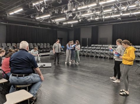 The cast of the show, She Kills Monsters, and their director, William Myatt, rehearse for their upcoming performances on April 26-27.