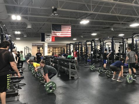 Many student athletes can be found working hard here in the lifting room.