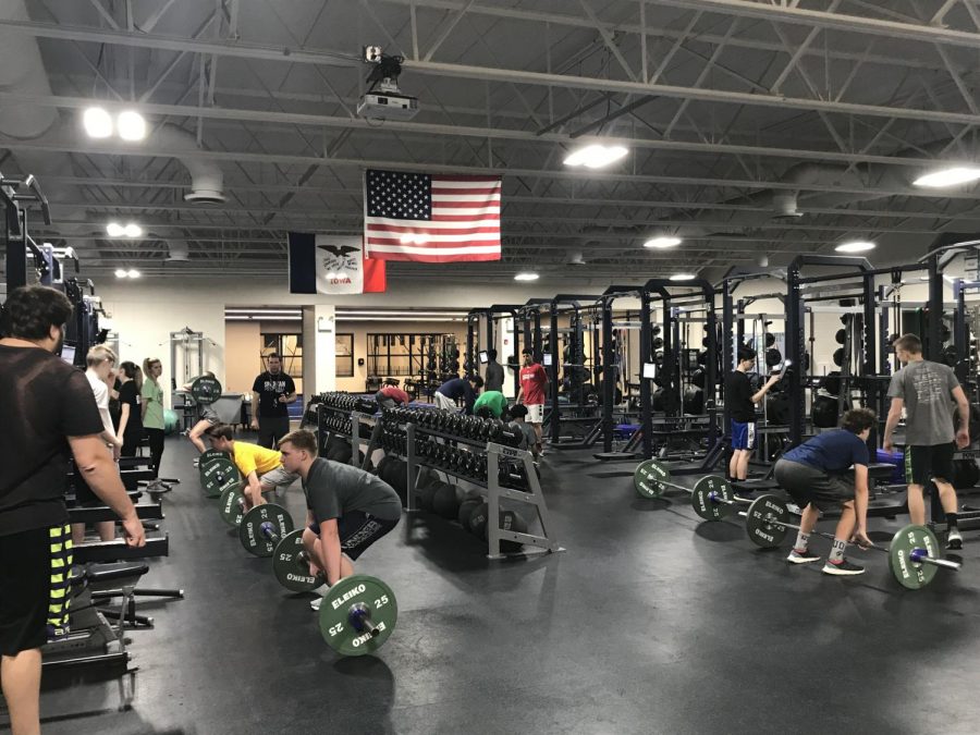 Many+student+athletes+can+be+found+working+hard+here+in+the+lifting+room.