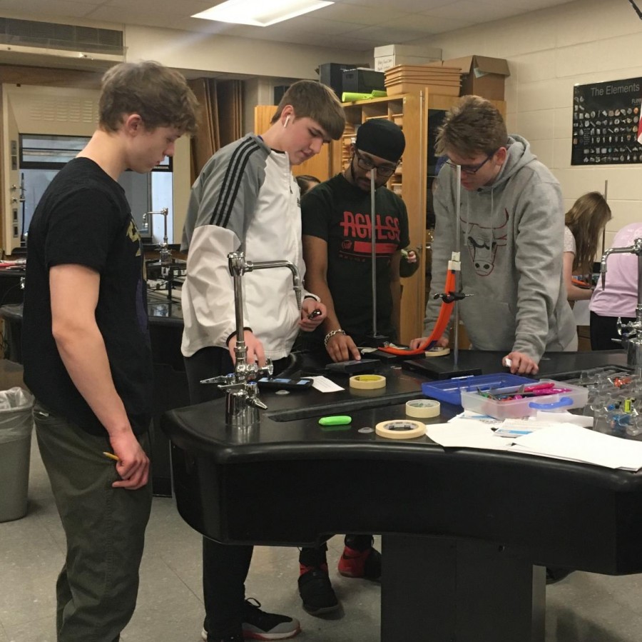 Josh Hoffman’s physics students experiencing hands-on learning through a visual lab.