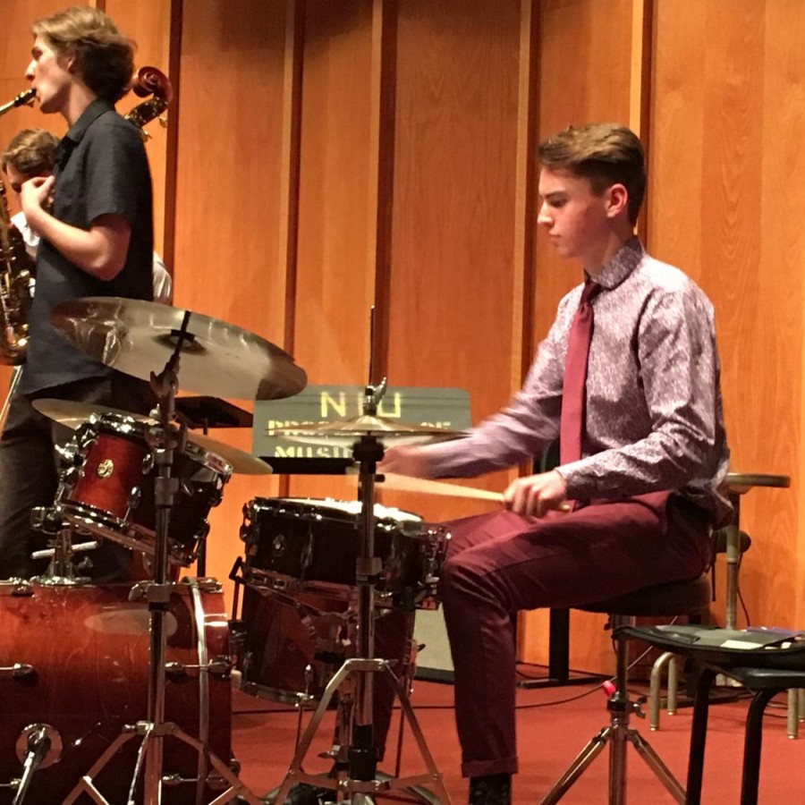 Jackson Schou drumming at a jazz workshop hosted by Northern Illinois University. 