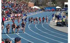 High school athletes line up for the 4x800 meter relay during the 2018 Drake Relays.