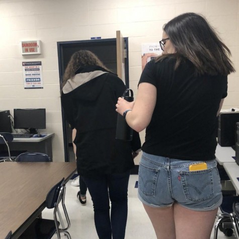 Students in Mrs. Dyer’s Honors Journalism class flee to a secure area of the computer lab after hearing the active shooter announcement and gunshots.
