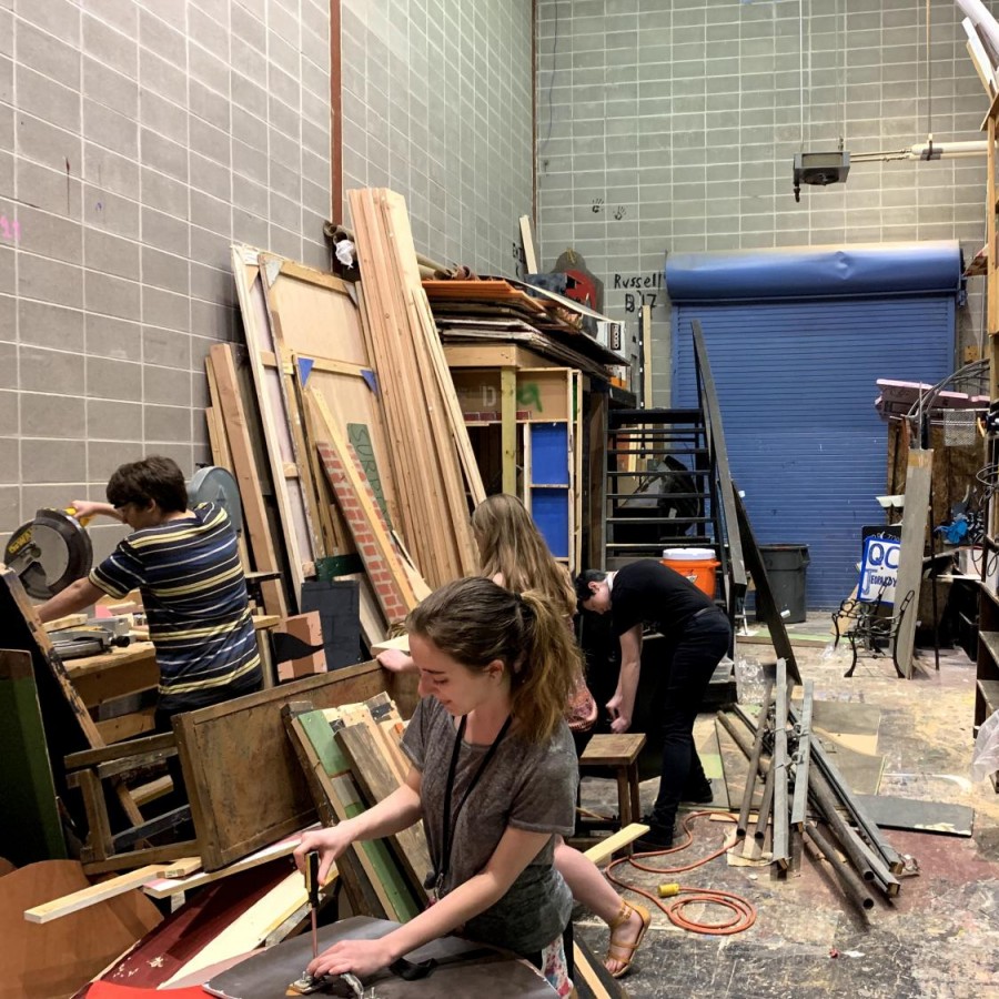 A group of students work in the shop to create the set for She Kills Monsters. 