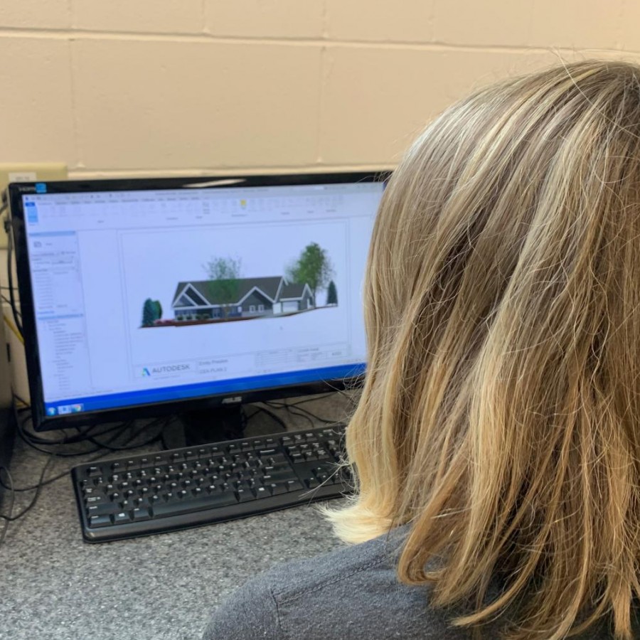  Senior Emily Preston working on the finishing touches of her project on Autodesk Revit. 
