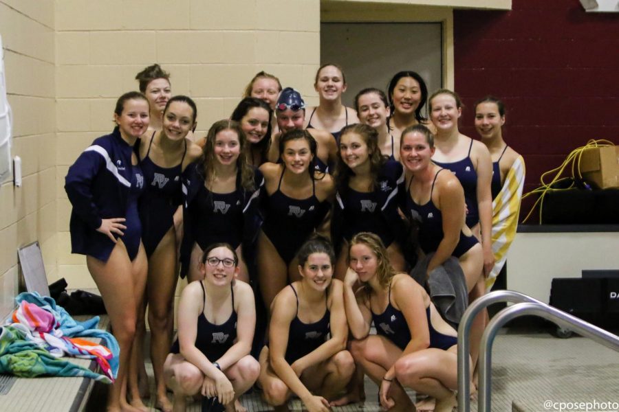 Girls swim team after competing in a meet this season.