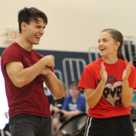 Bradley Hamilton and Morgan McCartney celebrate together after finishing their choreographed dance for the student body during the Student Hunger Drive Assembly on Friday, Sept. 20 at PVHS.
