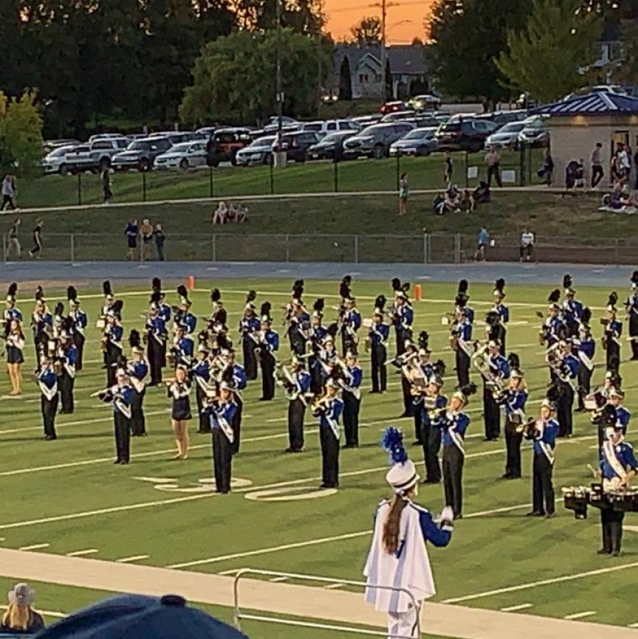 The Pleasant Valley Marching Band performs in their second pre-game performance.