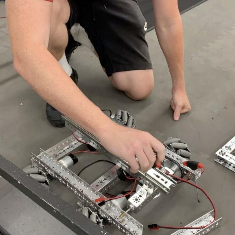 Kyle Sehlin is seen working on Everything Thats Radical’s robot.