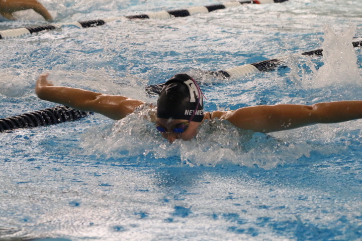 Senior Jordan Nemeyer swims the butterfly in the dual meet against Bettendorf.