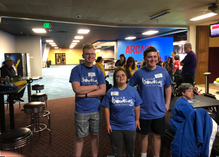 Connor Schlichte, Rachel Wanke and Ben Babcock, representing part of Pleasant Valley's Special Olympics Team, smile for a picture after their most recent bowling tournament.