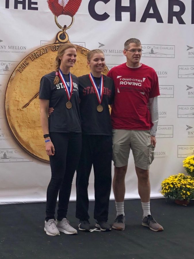 Elizabeth Sharis (middle) poses with Allie Rusher and her coach Peter Sharis after receiving their first place medals.