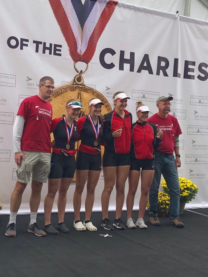 (from the left) Seniors Delaney Evans, Brenna Morley, Taylor English and Emma Mask hold up their medals during the awards ceremony. Evans and Morley won the junior womens double while Mask and English finished 25 seconds behind in 2nd place.