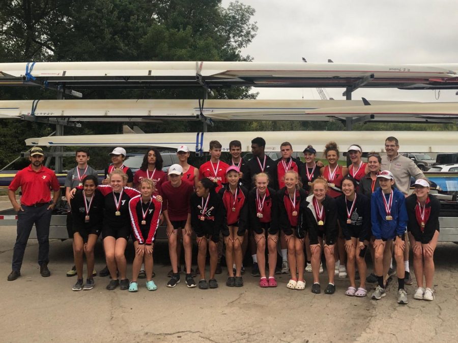The entire Y Quad Cities Rowing Team ends the productive day with a team picture with their medals. Every rower earned at least one medal during the regatta.