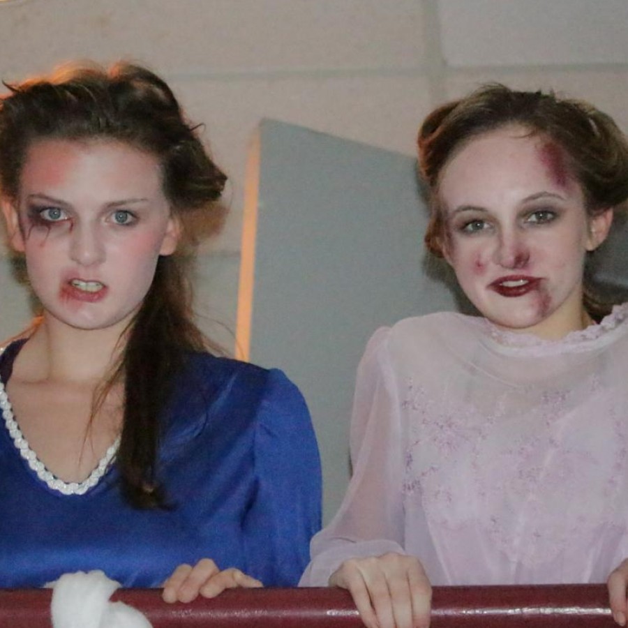 Addy Hegland and Rachel Schwartz dress up in last years haunted theatre.