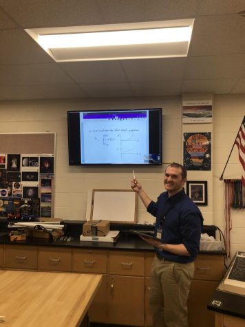 Ian Spangenberg teaches a lesson to his AP Physics II students.