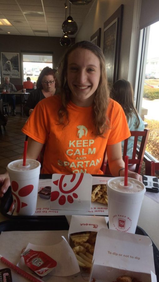 Senior+Brenna+Morley+enjoys+a+meal+at+popular+food+chain+Chick-fil-A.%0A
